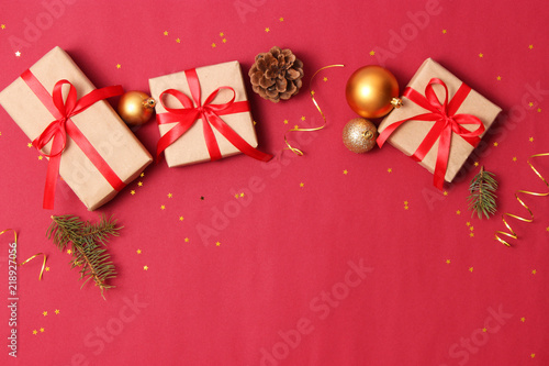 New Year's gifts, sweets and festive ribbons on a colored background. holiday, giving, new year, christmas, birthday