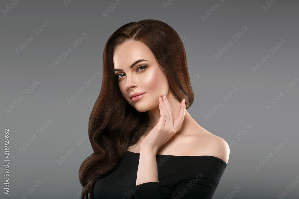 Brunette with perfect hair. Woman beautiful portrait with healthy long hairstyle curly and perfect. Brunette with perfect hair. Woman beautiful portrait with healthy long hairstyle curly and perfect.