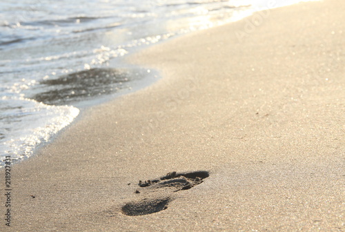footprint on sandy beach
