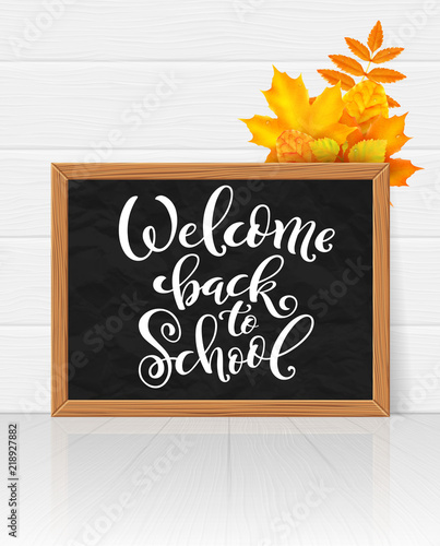 Welcome back to school hand-drawn lettering background.