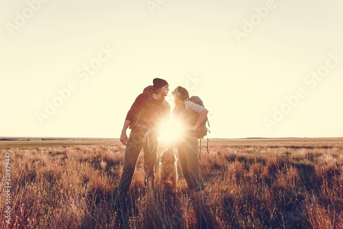 Couple hiking together in the wilderness photo