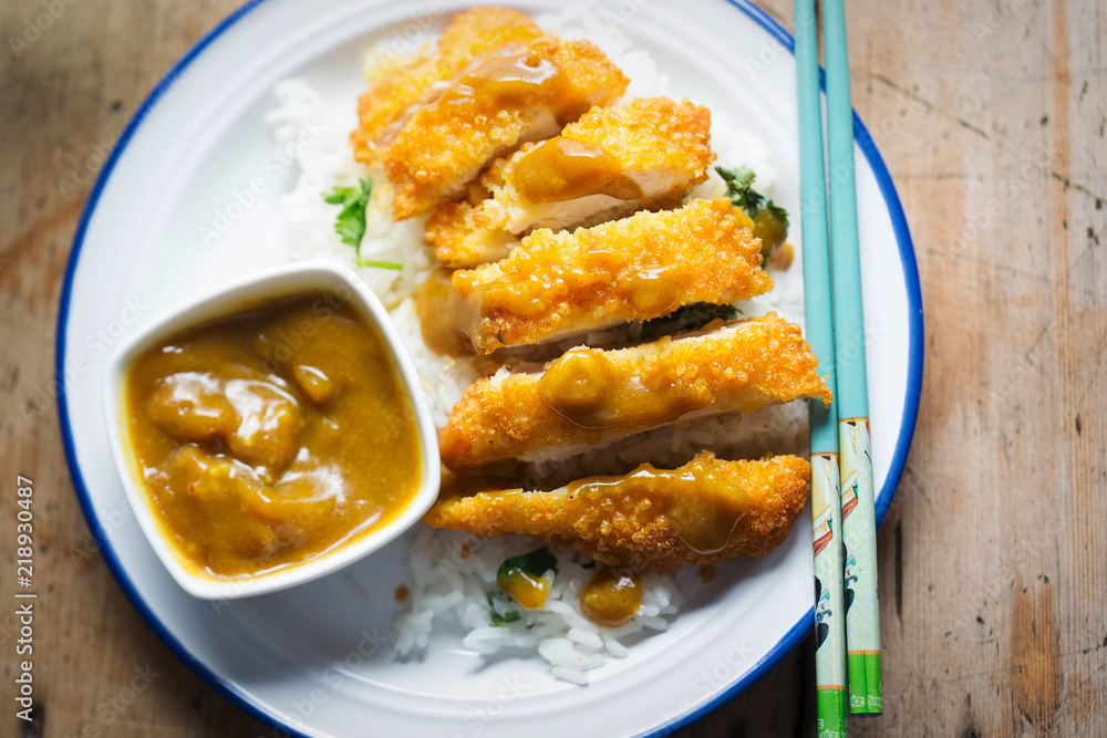 Crispy Katsu Chicken Curry with rice & parsley Crispy Katsu Chicken Curry with rice & parsley