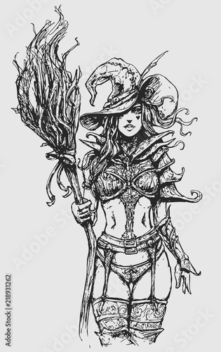 Attractive witch in a revealing costume