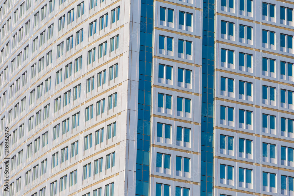 Modern office building with glass reflection