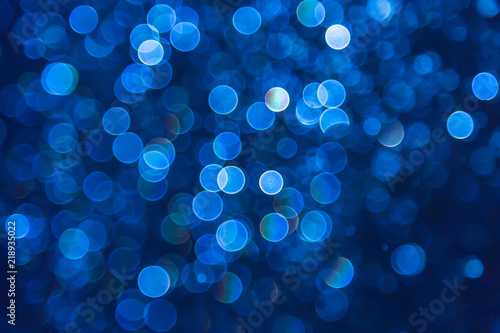 Blue glitter bokeh lights bokeh defocused