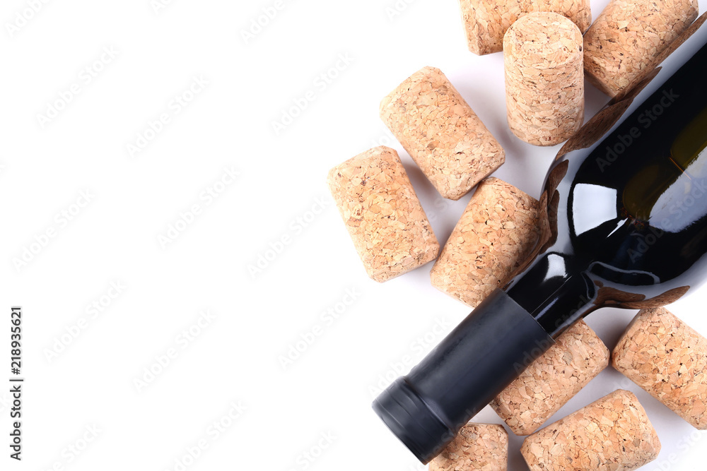 Wine bottle with corks on white background