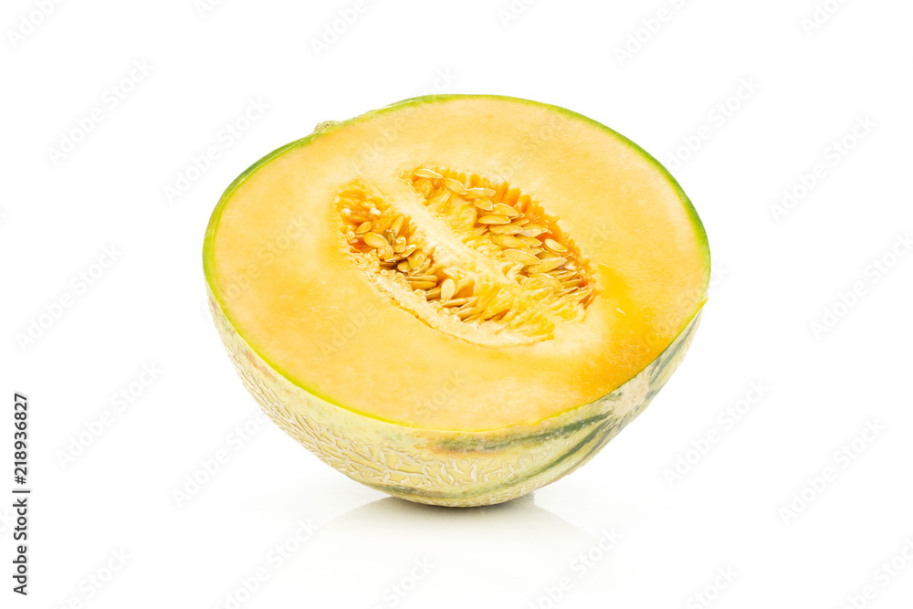 One half of fresh melon cantaloupe variety isolated on white background