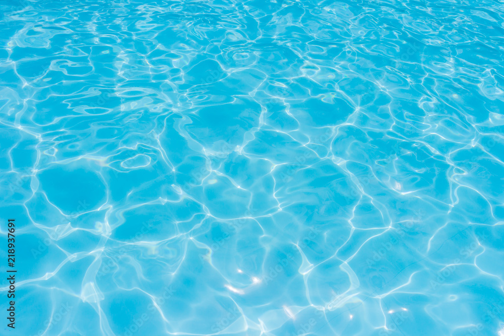 water in swimming pool rippled water detail water in swimming pool rippled water detail