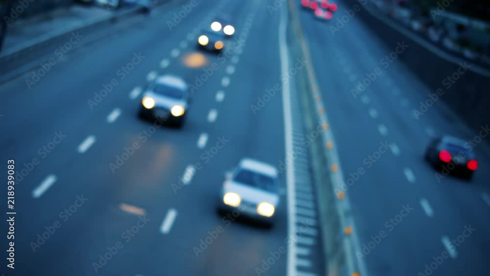 Traffic car lights on the night city street. Video of bokeh of blurred car lights on dusk highway Traffic car lights on the night city street. Video of bokeh of blurred car lights on dusk highway