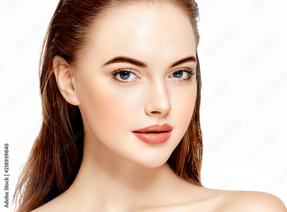 Beauty woman face with healthy skin lips natural makeup healthy fresh skin and hair isolated on white Beauty woman face with healthy skin lips natural makeup healthy fresh skin and hair isolated on white