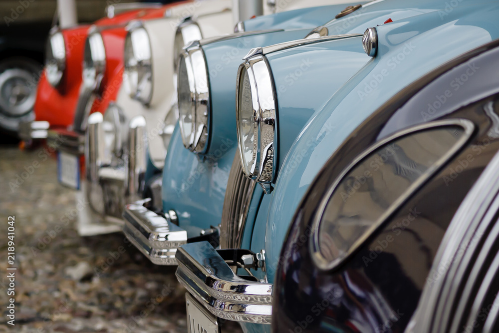 Old cars row at an event´s exhibition
