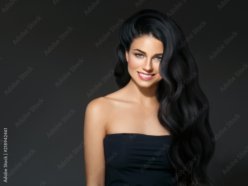 Black hair woman. Beautiful brunette hairstyle fashion portrait over dark background Black hair woman. Beautiful brunette hairstyle fashion portrait over dark background