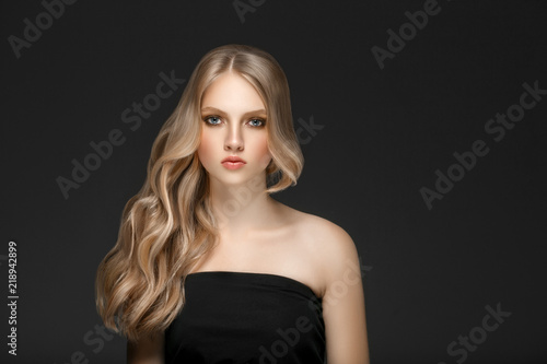 Beautiful Woman Face Portrait Beauty Skin Care Concept with long blonde hair 