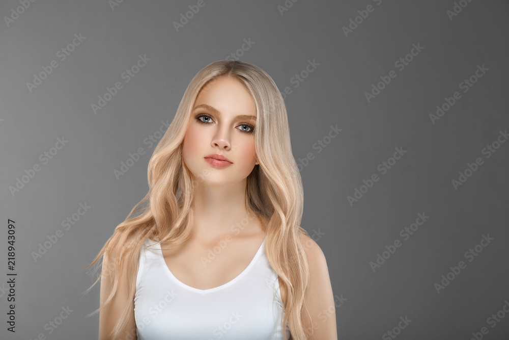 Beautiful Woman Face Portrait Beauty Skin Care Concept with long blonde hair Beautiful Woman Face Portrait Beauty Skin Care Concept with long blonde hair