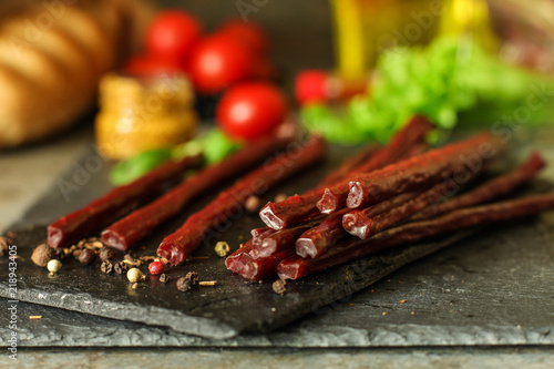 Cuadro en lienzo salami, salted meat jerky - sliced ​​with slices (venison)