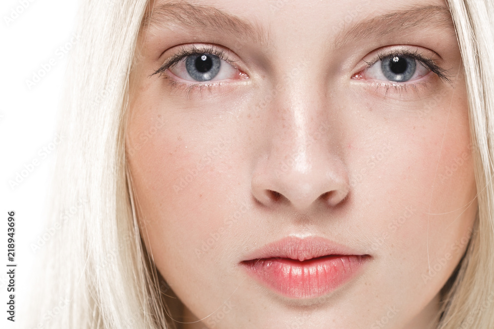 Closeup woman face with healthy skin beauty eyes and lips blonde beautiful girl Closeup woman face with healthy skin beauty eyes and lips blonde beautiful girl