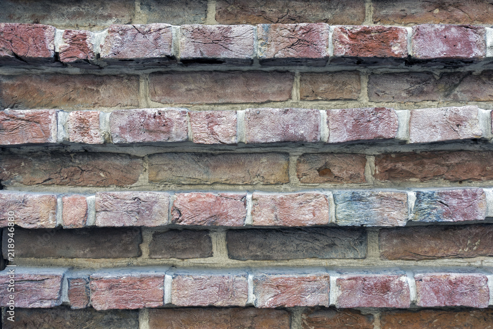 Old wall from red bricks. Texture background