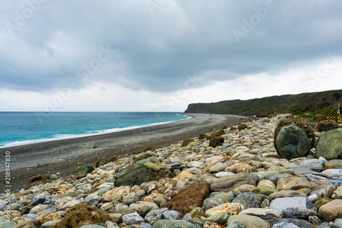 Shingle beach on pacific ocean coast in Qixingtan Scenic Area Hualien Taiwan photo