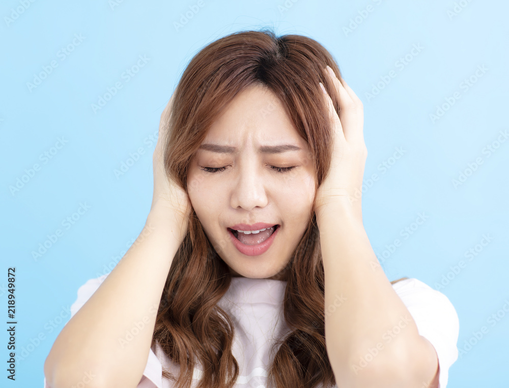 Fototapeta premium young woman with worried and stressed face