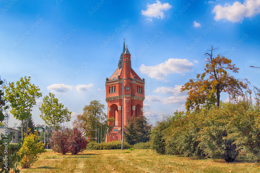 Fototapeta premium WROCLAW, POLAND - AUGUST 18, 2018: The water tower at Sudecka Street in Wroclaw, 63 meters high, designed by Karl Klimm. Built 1904-1905, situated in Borek, the district of Krzyki, Wroclaw, Poland.