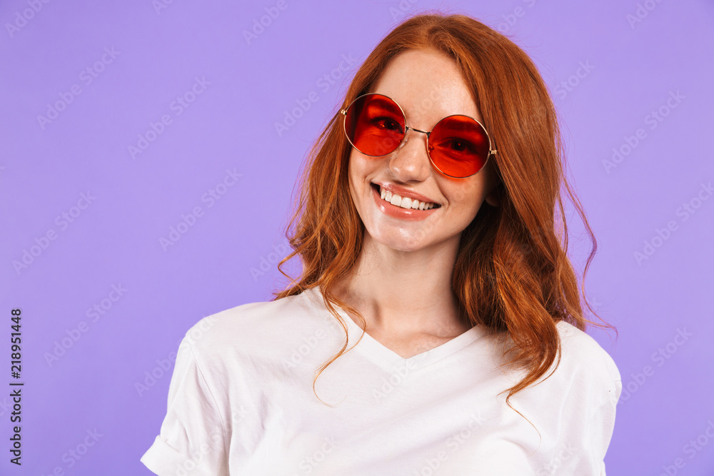 Portrait of a smiling young girl in sunglasses Portrait of a smiling young girl in sunglasses
