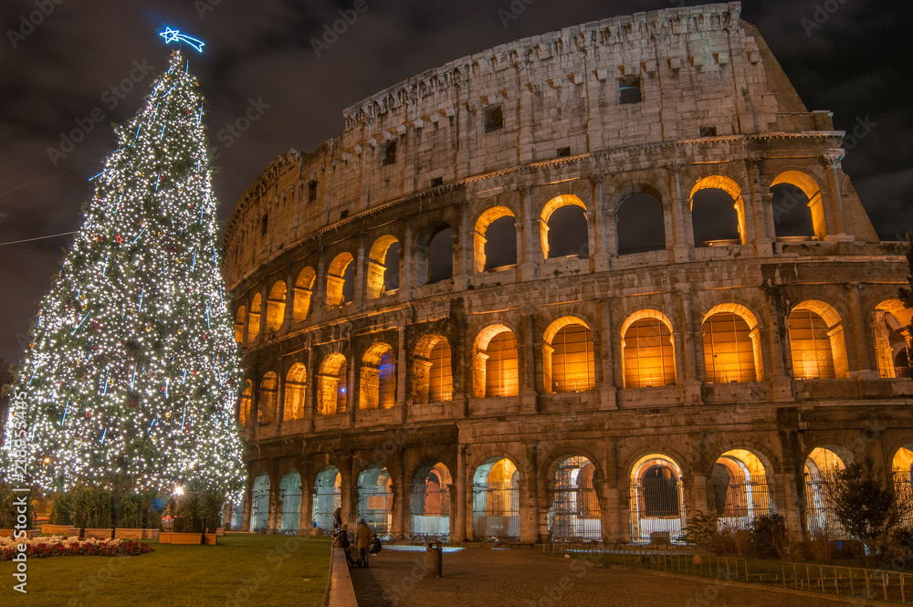Night in Rome, Christmas tree near Colosseum 