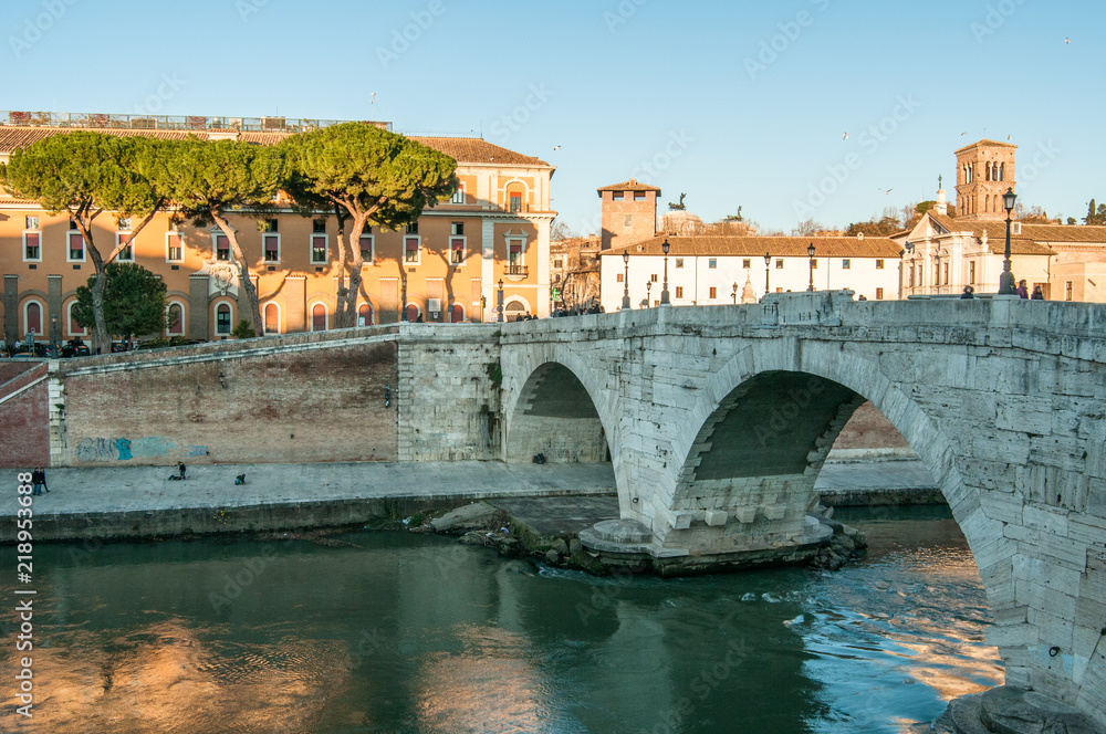 Old bridge in Rome, sunlight, Italy