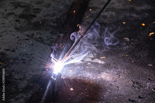 Ironman is convinced by electric welding machine.