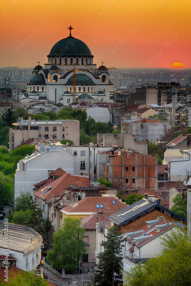 Naklejka premium Belgrade panorama with the temple of St. Sava and sunset