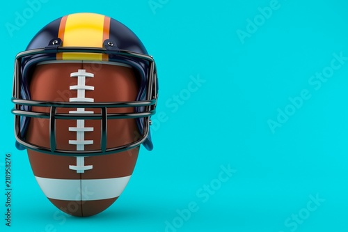Football helmet with rugby ball photo