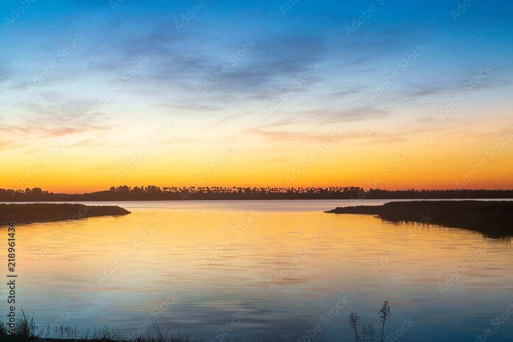 Pre dawn sky over lake in Florida