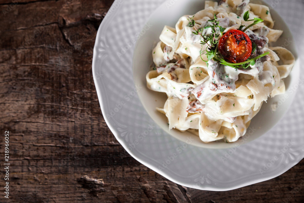 Pasta with mushrooms in creamy sauce Pasta with mushrooms in creamy sauce