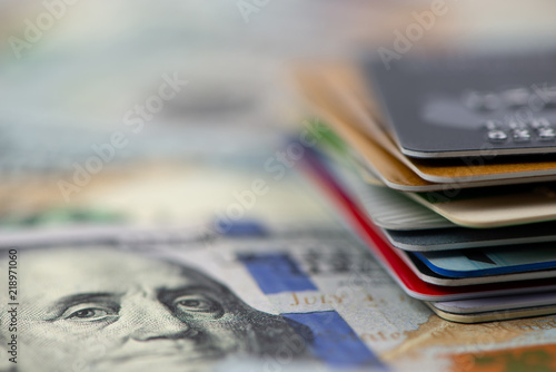 Stack of multicolored credit cards close-up 