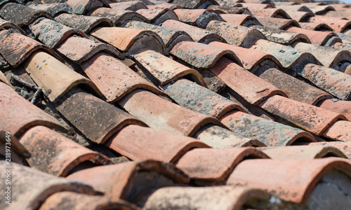 old Tiled roof close-up, clay tile, history