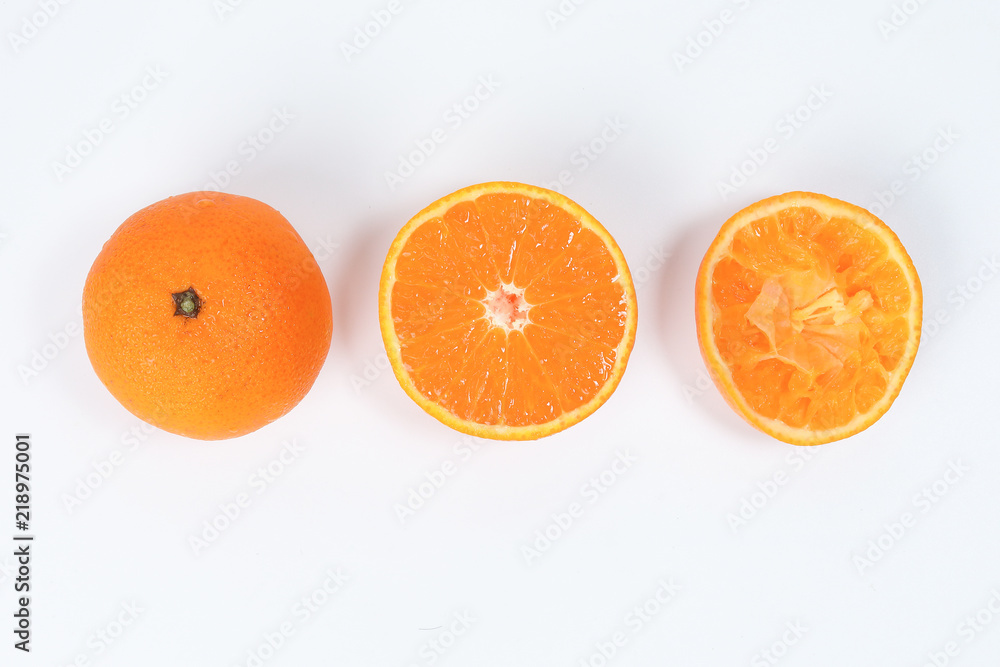 Mandarin Orange Fruit slice half juiced extracted on white background Mandarin Orange Fruit slice half juiced extracted on white background
