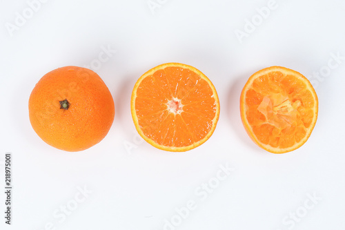 Mandarin Orange Fruit slice half juiced extracted on white background