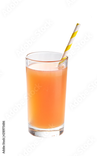 a glass with grapefruit juice