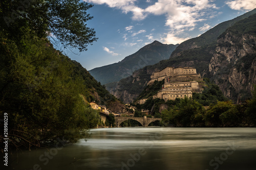Quadro em tela aosta old castle with river in north italy cloudy sky forte di bard