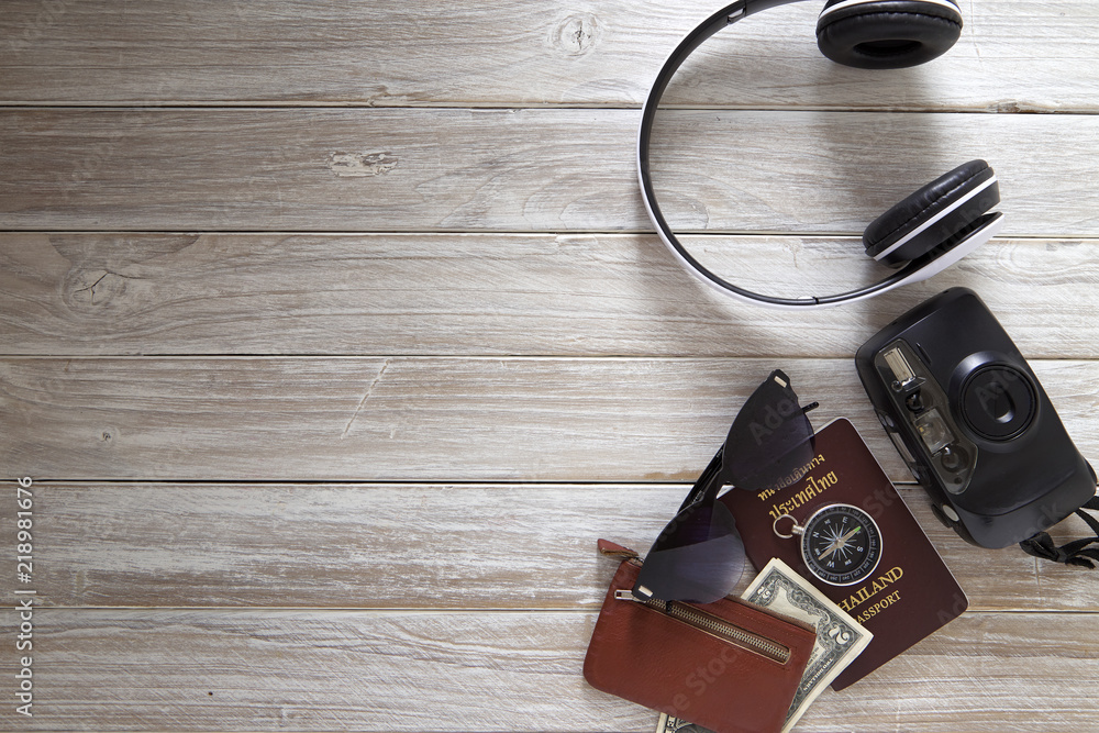 Travel accessories is new year 2019 for summer trip on black white wooden background d, copy space,top view Travel accessories is new year 2019 for summer trip on black white wooden background d, copy space,top view