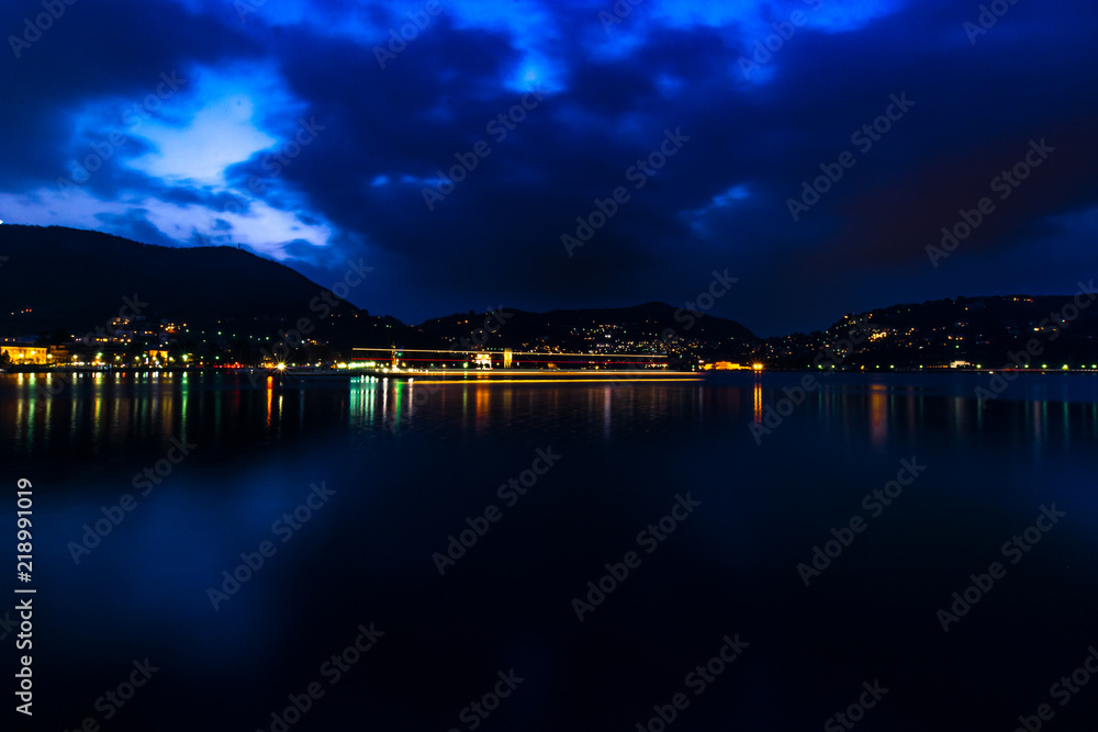 Como Lake, Lombardia, Italy. Picture made during last hours of light on this beautfiul place, one of the nicest in Italy. Como lake at night, long exposure.