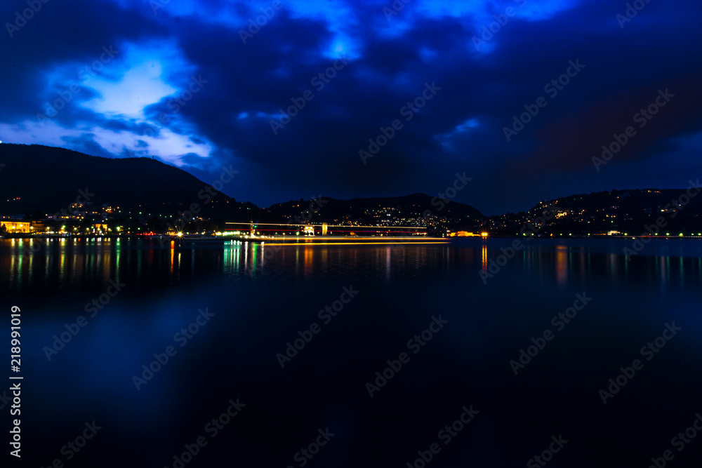 Como Lake, Lombardia, Italy. Picture made during last hours of light on this beautfiul place, one of the nicest in Italy. Como lake at night, long exposure. Como Lake, Lombardia, Italy. Picture made during last hours of light on this beautfiul place, one of the nicest in Italy. Como lake at night, long exposure.
