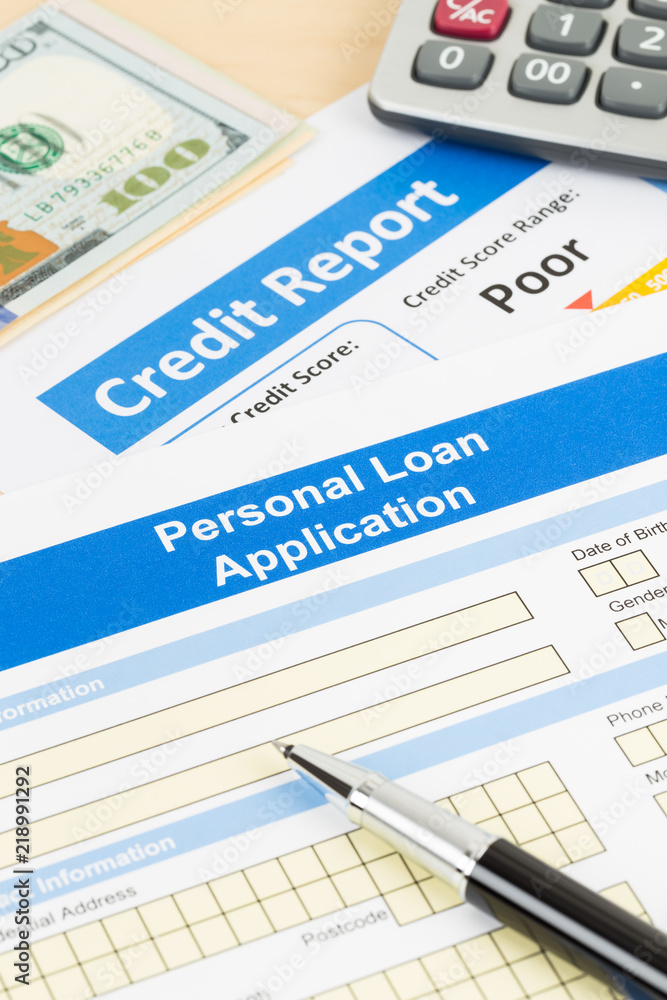Personal loan application form poor credit score with calculator, dollar money, and pen Personal loan application form poor credit score with calculator, dollar money, and pen