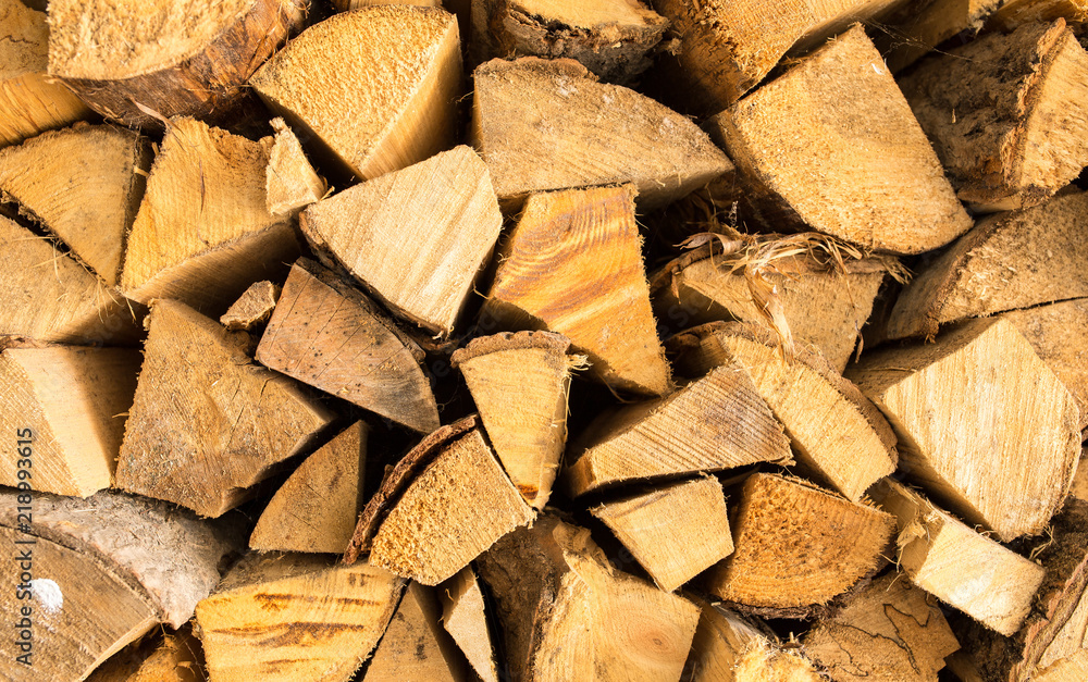 randomly stacked wood for the stove randomly stacked wood for the stove