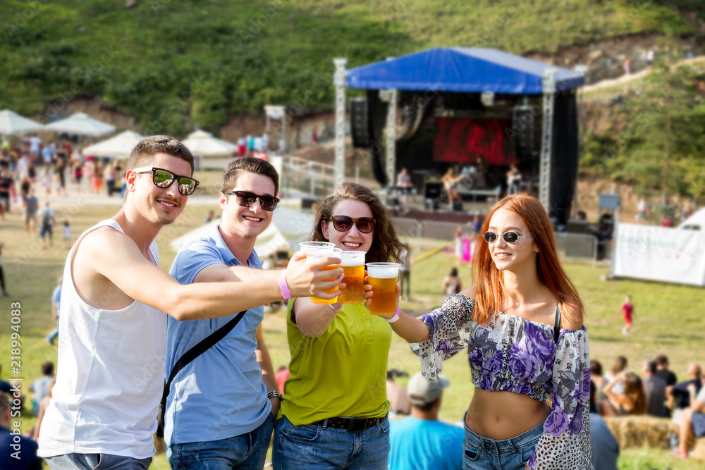 Friends enjoy in Rock concert on the field