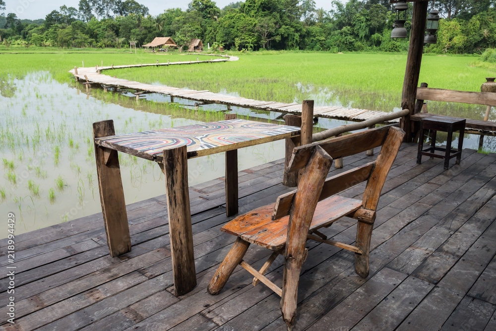 wooden terrace near paddy rice field wooden terrace near paddy rice field