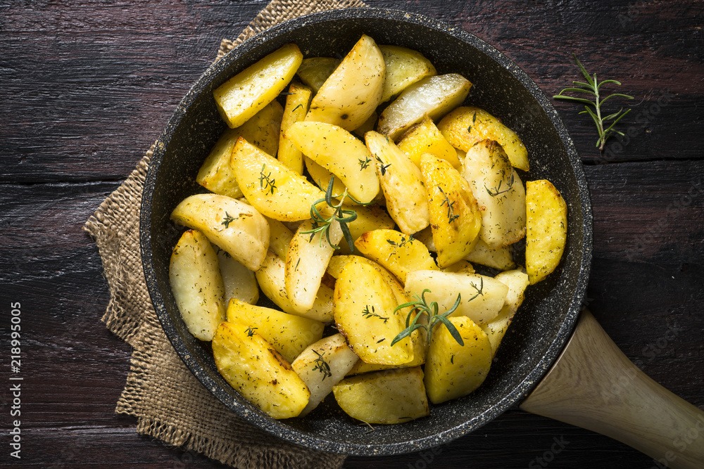 Baked potato with herbs top view. Baked potato with herbs top view.