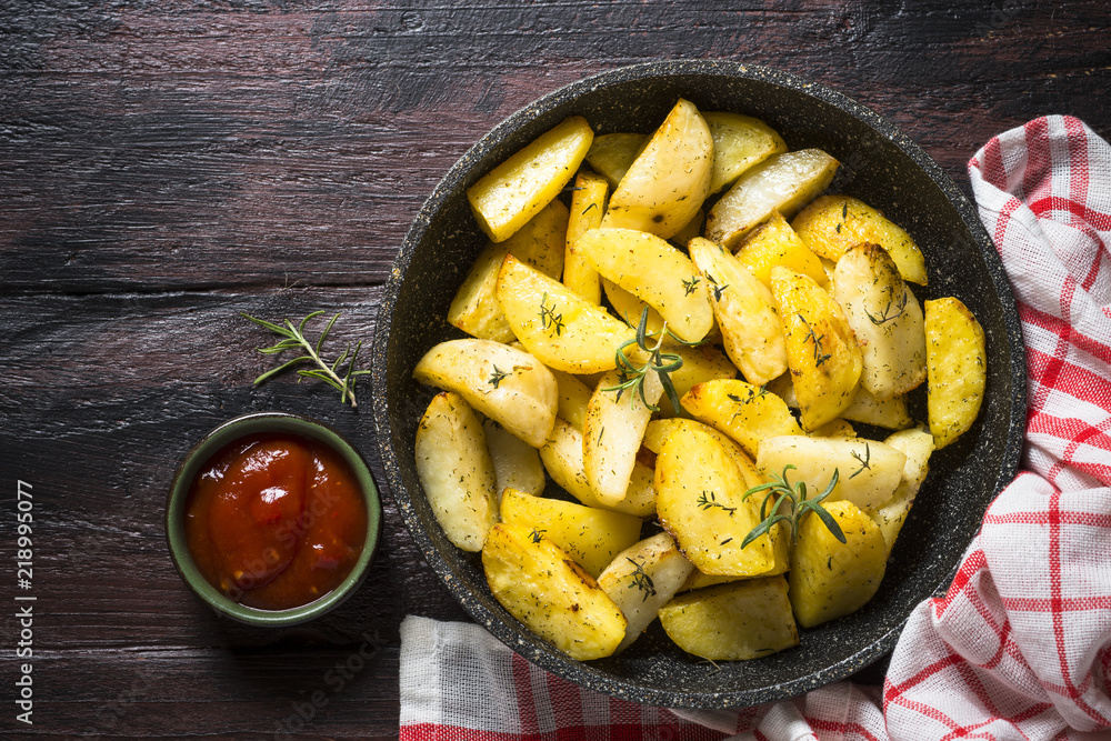 Baked potato with herbs top view. Baked potato with herbs top view.