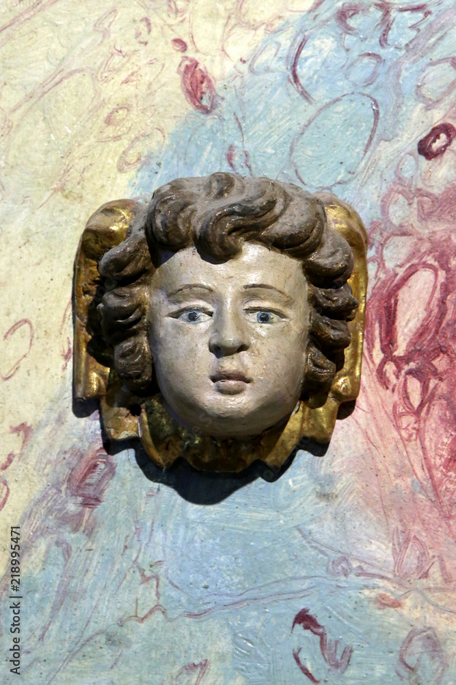 Angelot baroque. Eglise Notre-Dame de la Gorge. Les Contamines-Montjoie. / Baroque angel. Church of Our Lady of the Gorge. Contamines-Montjoie. Angelot baroque. Eglise Notre-Dame de la Gorge. Les Contamines-Montjoie. / Baroque angel. Church of Our Lady of the Gorge. Contamines-Montjoie.