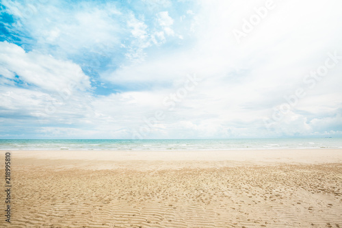 Tropical beach and sea with white sand cloud and blue sky background