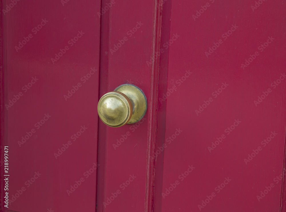 retro brass door furniture on a red door retro brass door furniture on a red door